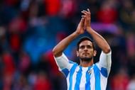 MADRID, SPAIN - APRIL 23:  Roque Santa Cruz of Malaga CF waves Malaga CF fans after loosing the La Liga match between Club Atletico de Madrid and Malaga CF at Vicente Calderon Stadium on April 23, 2016 in Madrid, Spain.  (Photo by Gonzalo Arroyo Moreno/Getty Images)